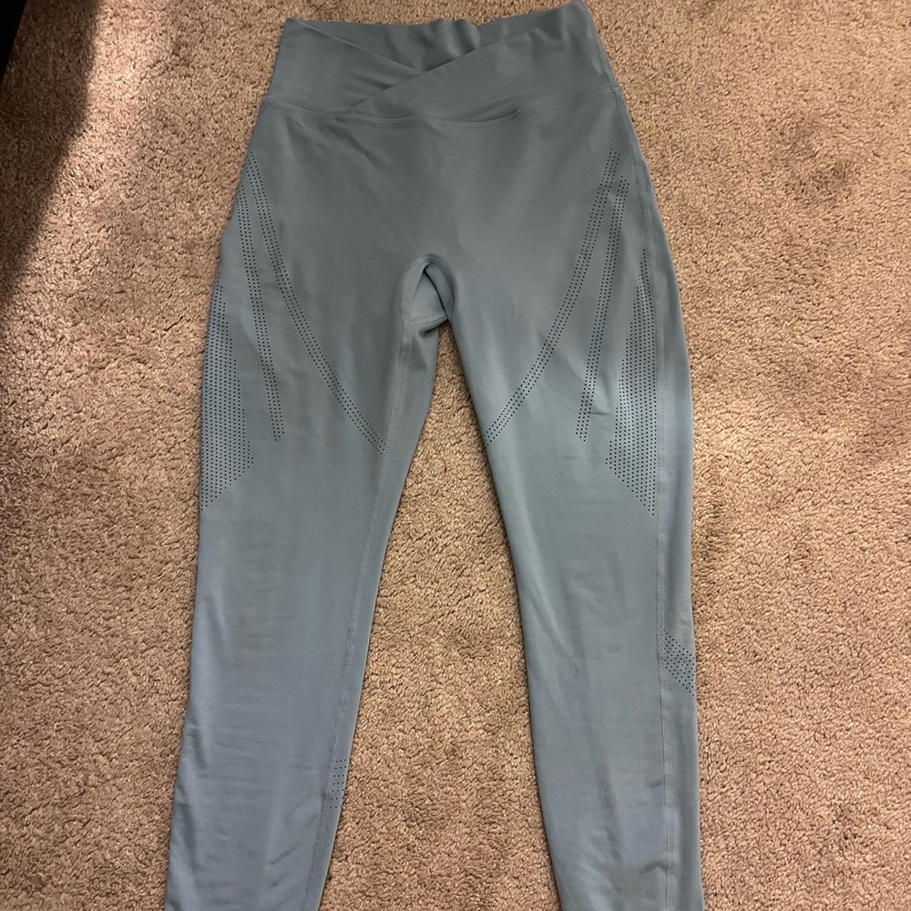 Alphalete surface laser cut leggings